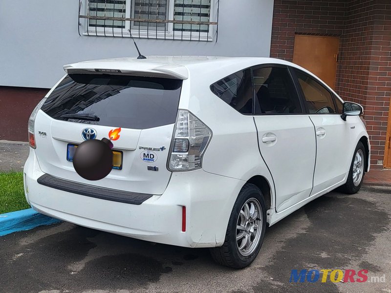 2013' Toyota Prius + photo #1