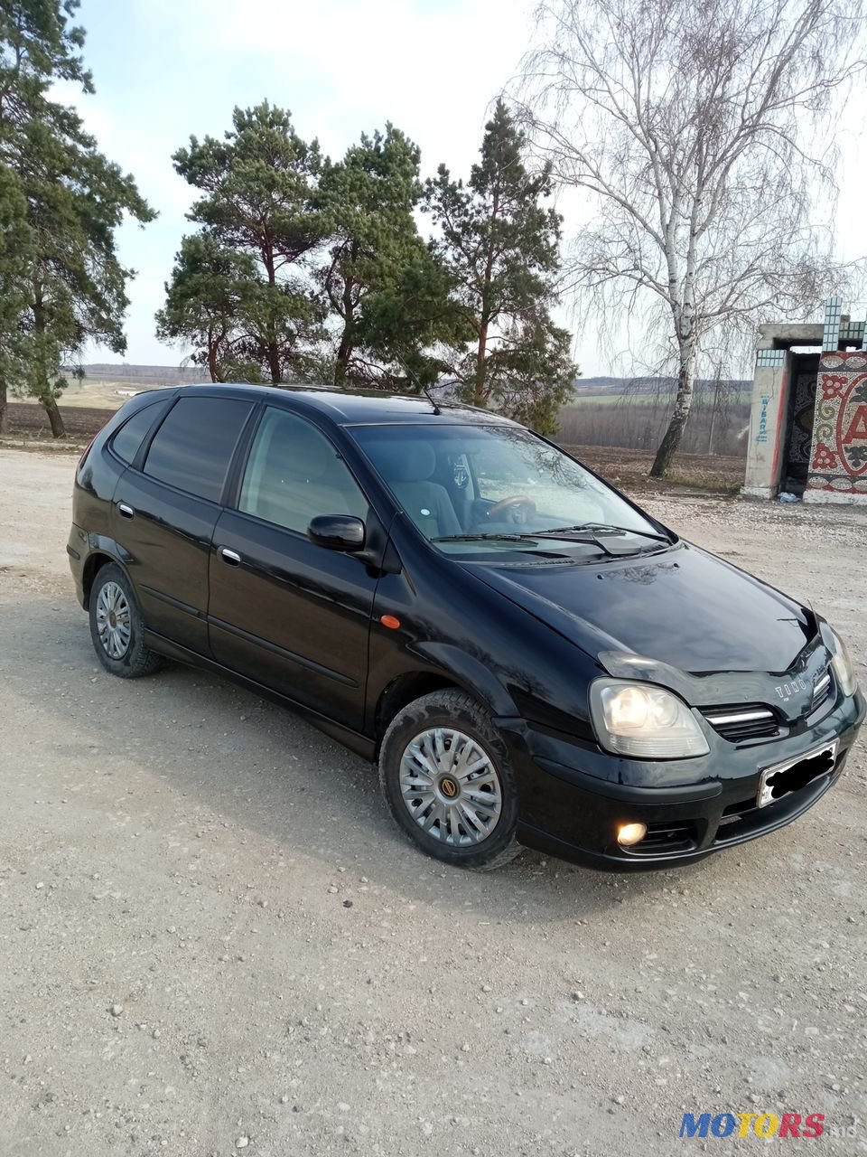 2003' Nissan Almera Tino photo #2