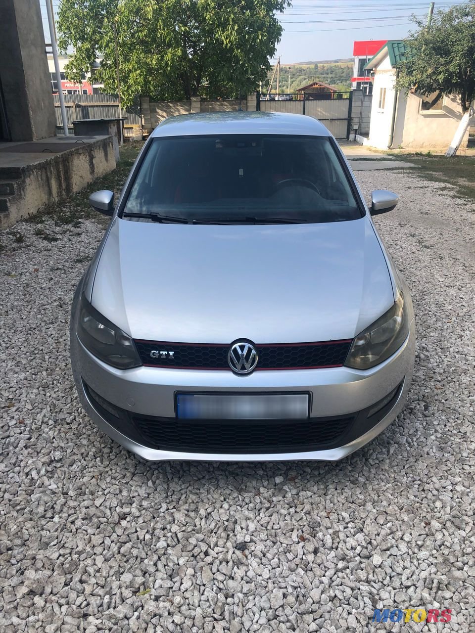 2011' Volkswagen Polo photo #1