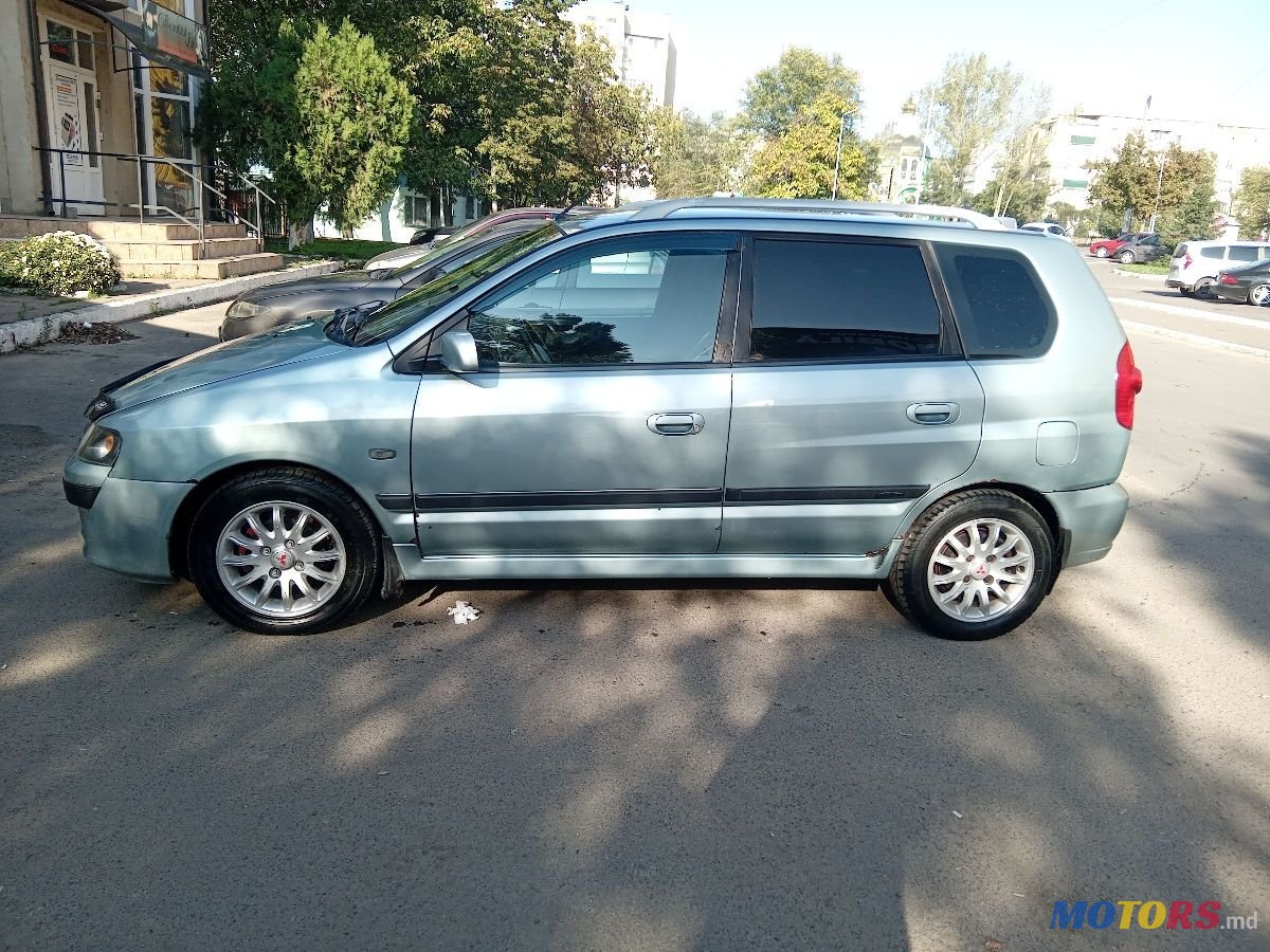 2004' Mitsubishi Space Star photo #2