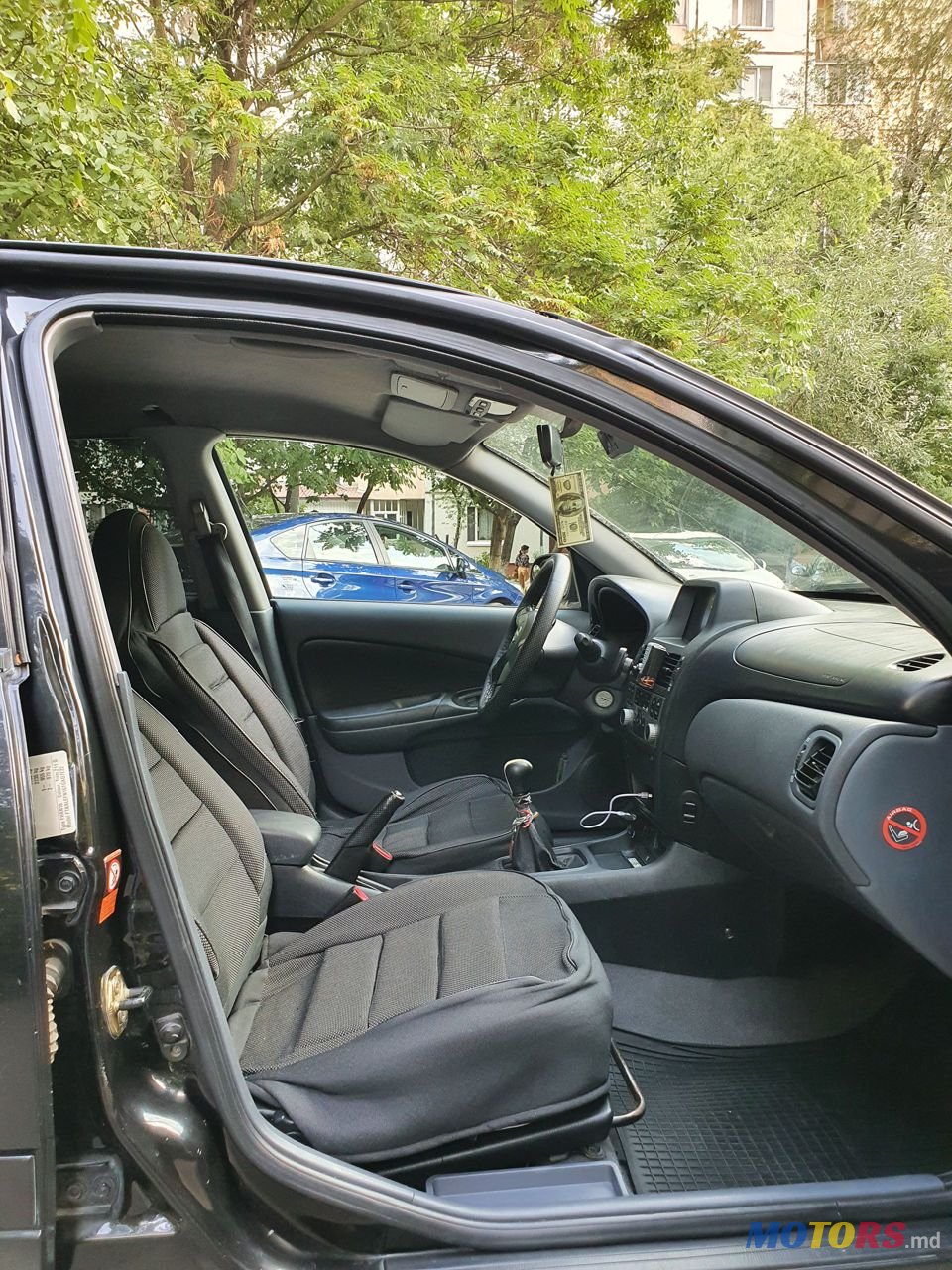 2005' Nissan Almera photo #5