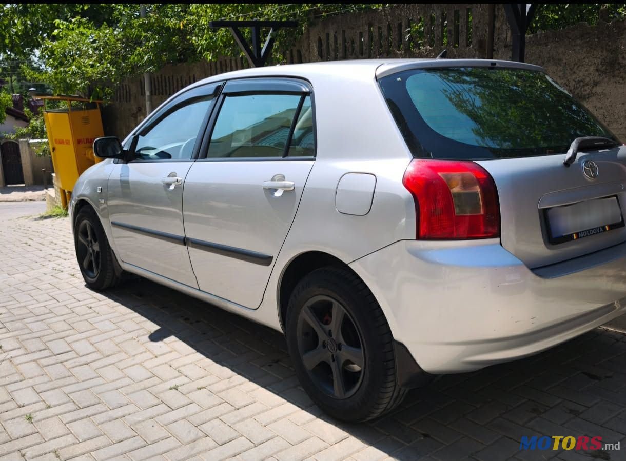 2004' Toyota Corolla photo #1