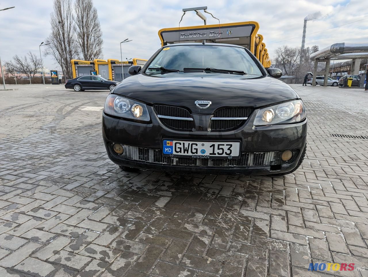 2005' Nissan Almera photo #2