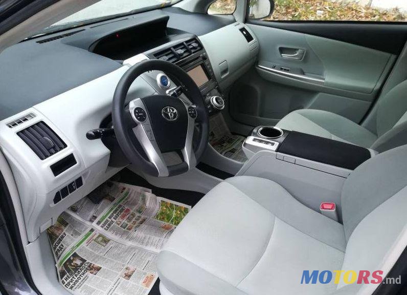 2013' Toyota Prius + photo #1