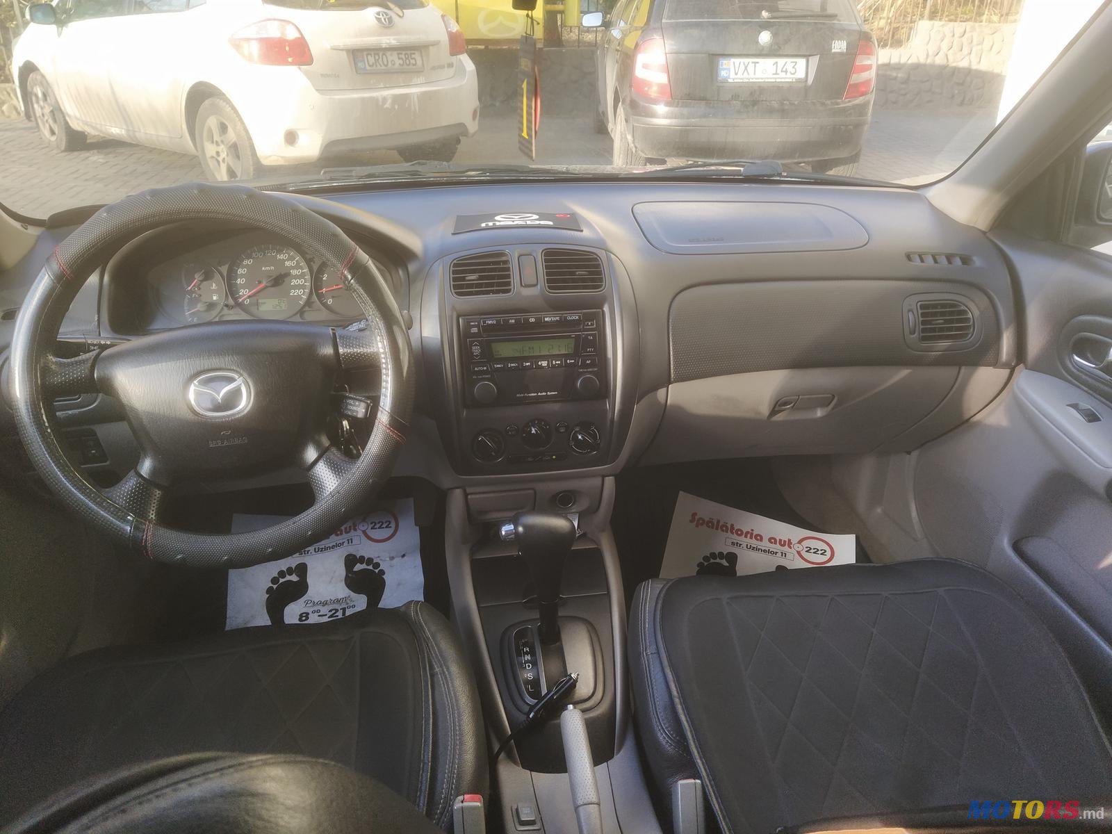 2001' Mazda 323 photo #3