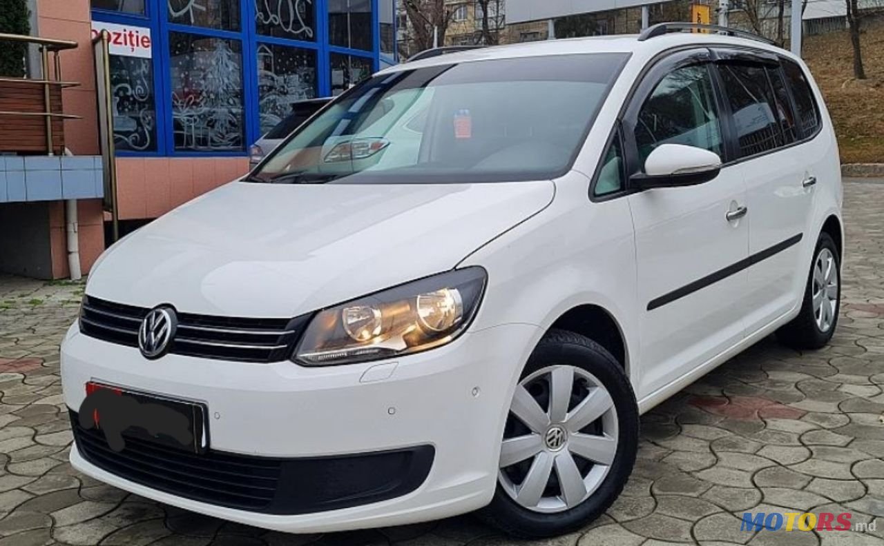 2012' Volkswagen Touran photo #1
