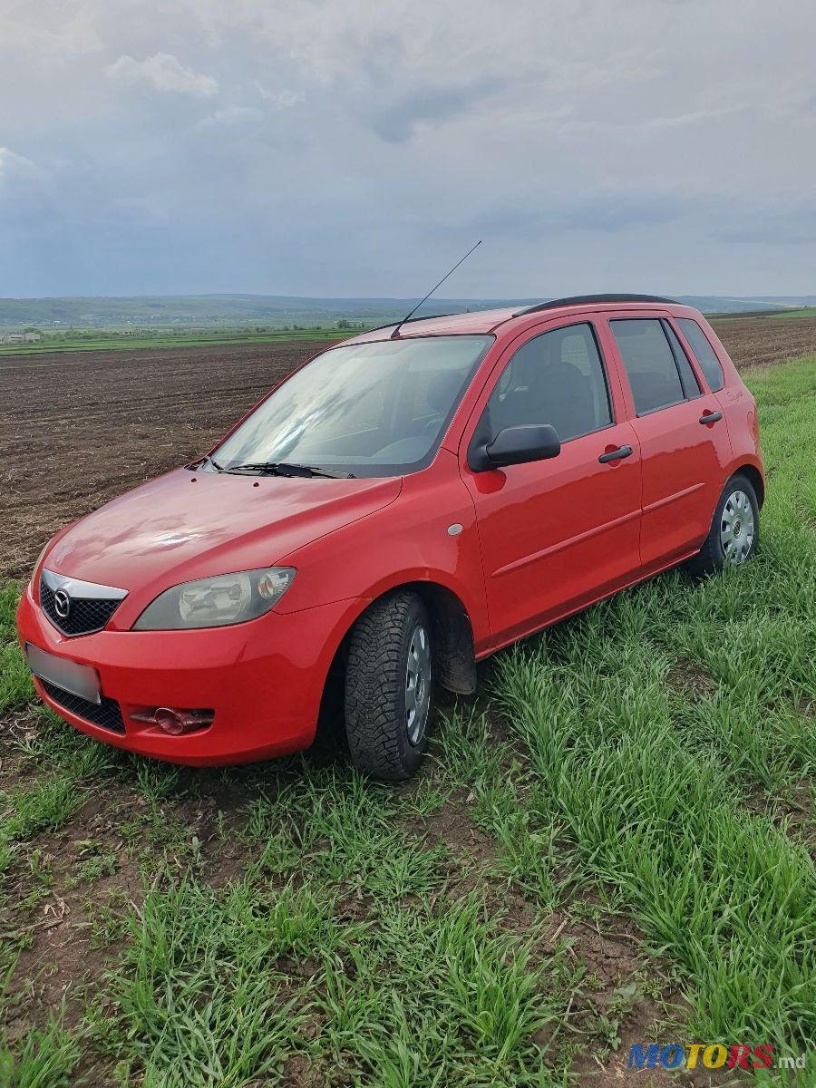 2004' Mazda 2 photo #1