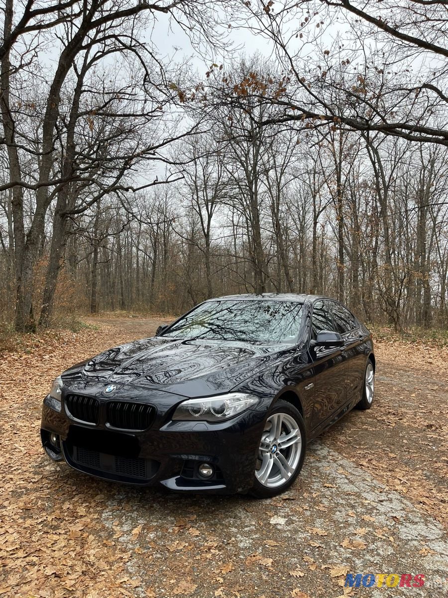 2016' BMW 5 Series photo #1