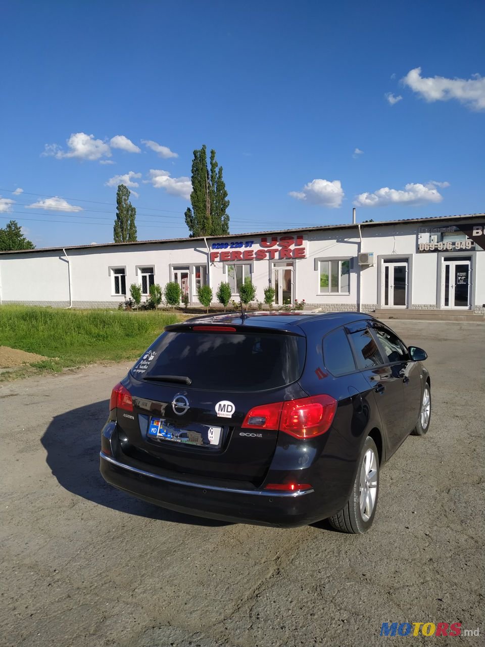 2013' Opel Astra photo #1