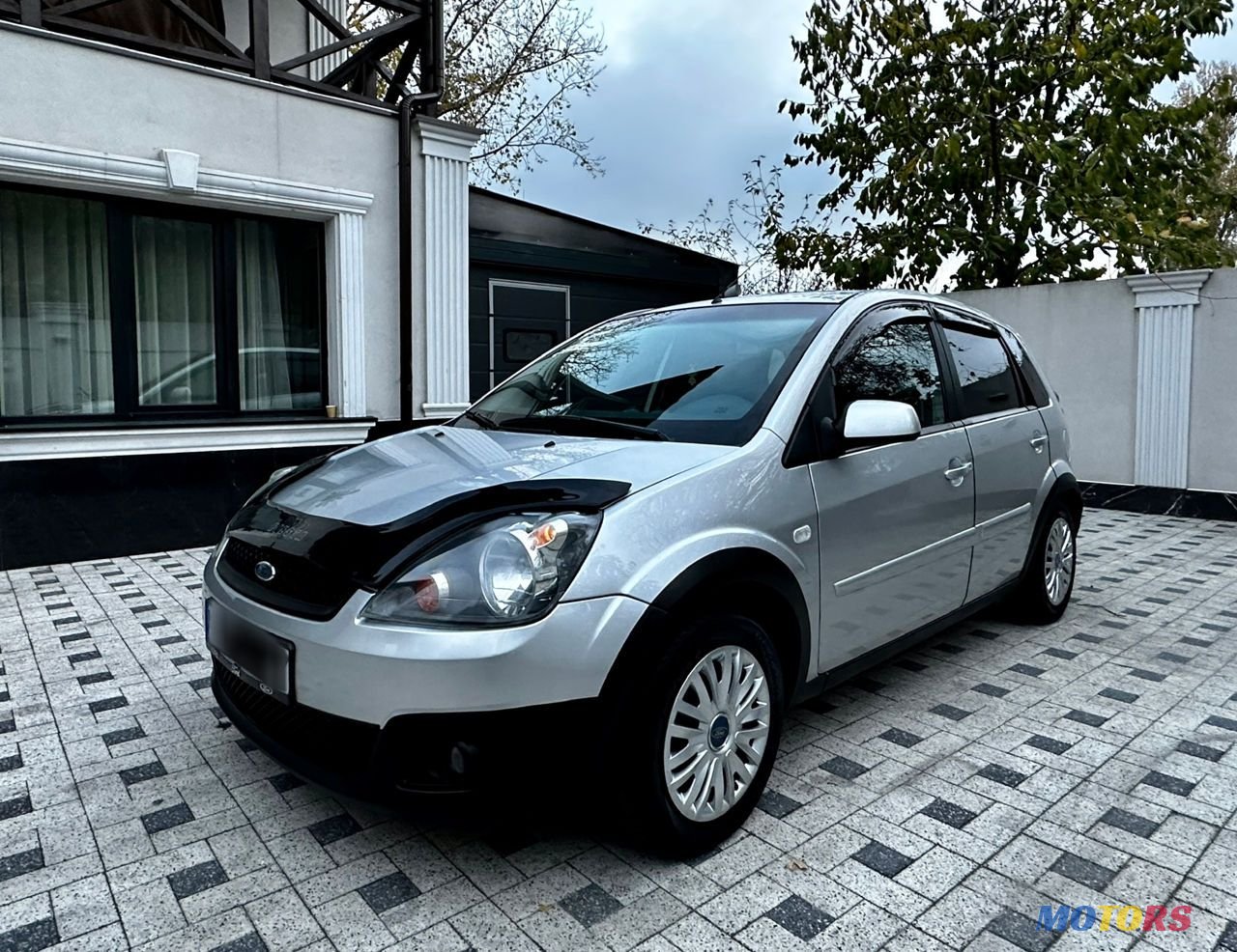 2007' Ford Fiesta 5D photo #1