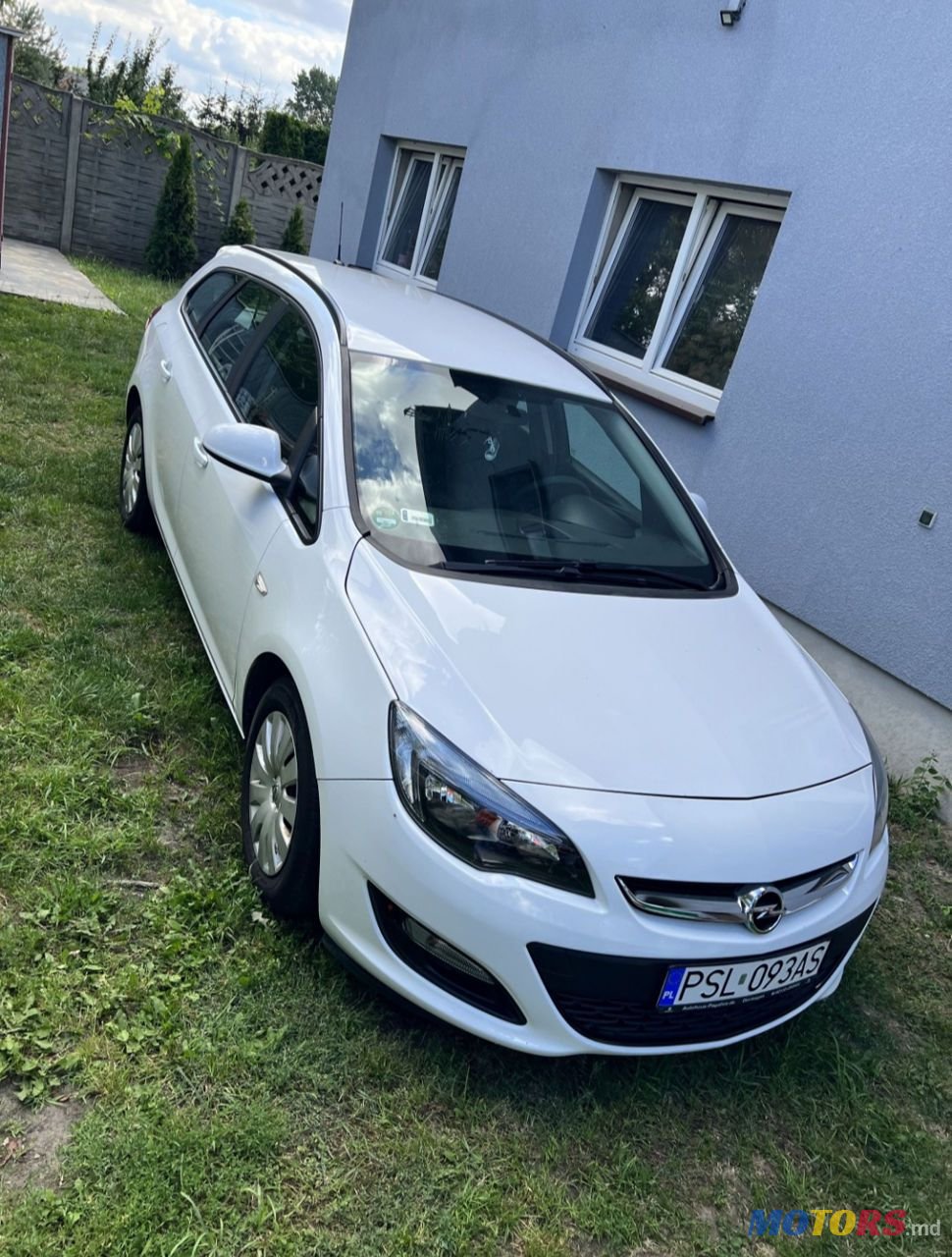 2014' Opel Astra photo #1