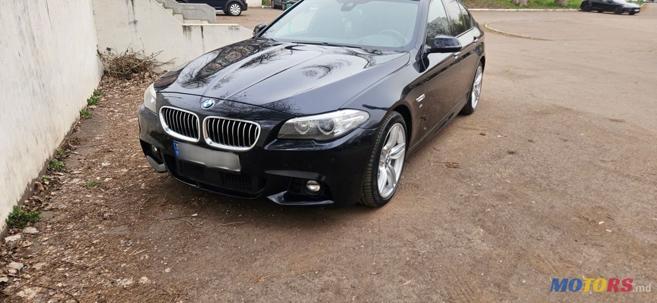 2014' BMW 5 Series photo #1