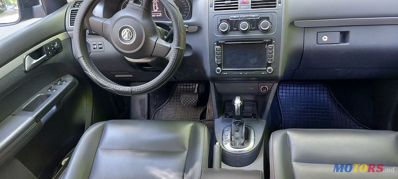 2015' Volkswagen Touran photo #1