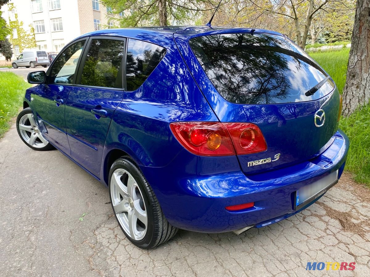 2004' Mazda 3 photo #2