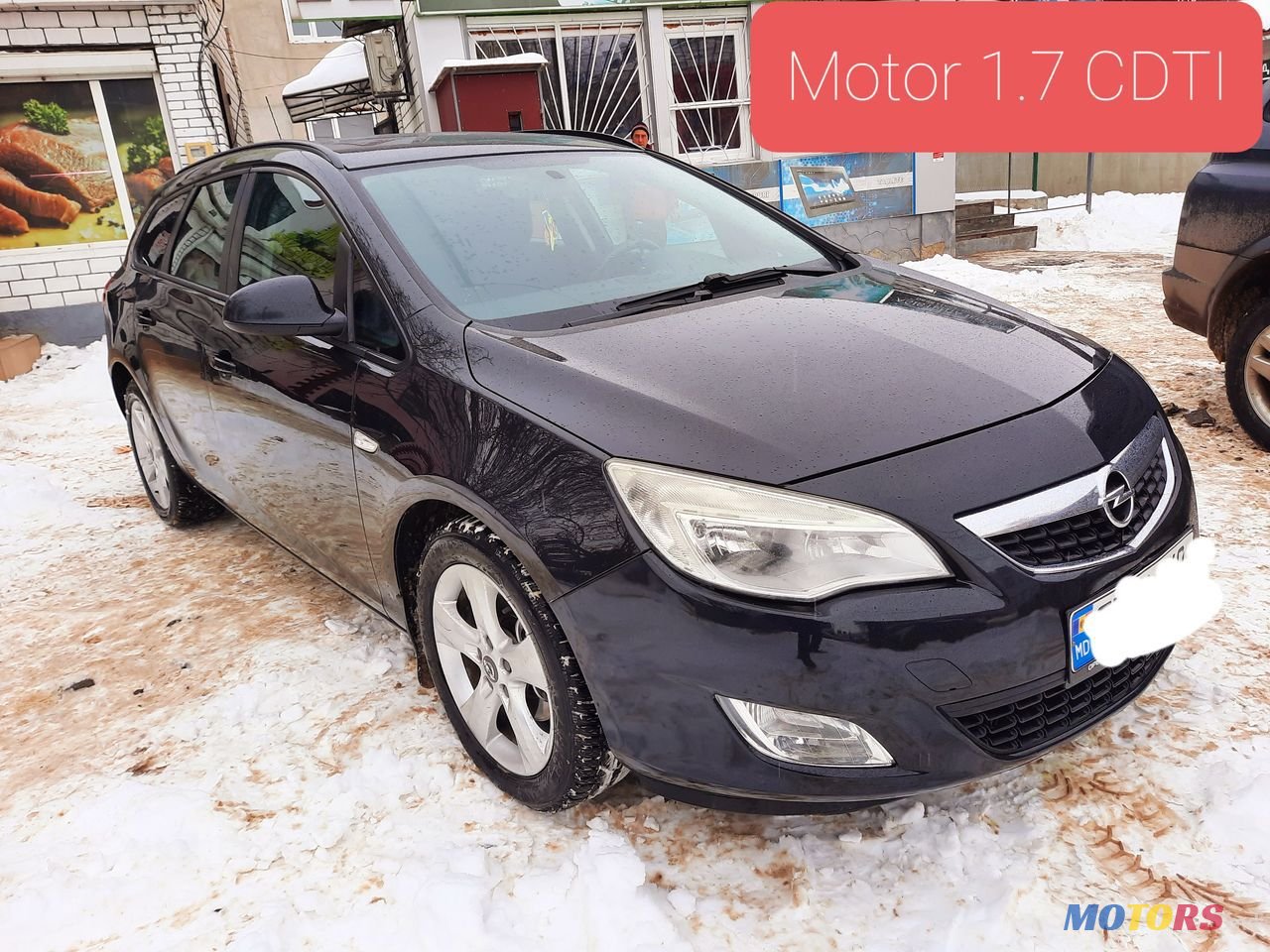 2011' Opel Astra photo #1