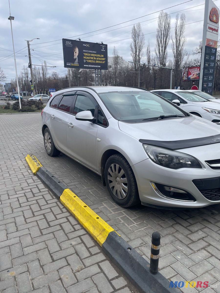 2013' Opel Astra photo #1