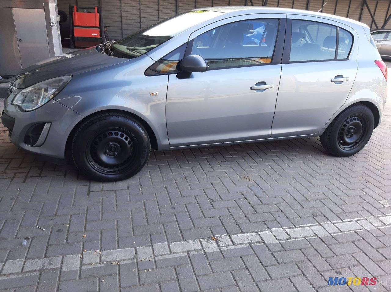 2011' Opel Corsa photo #4