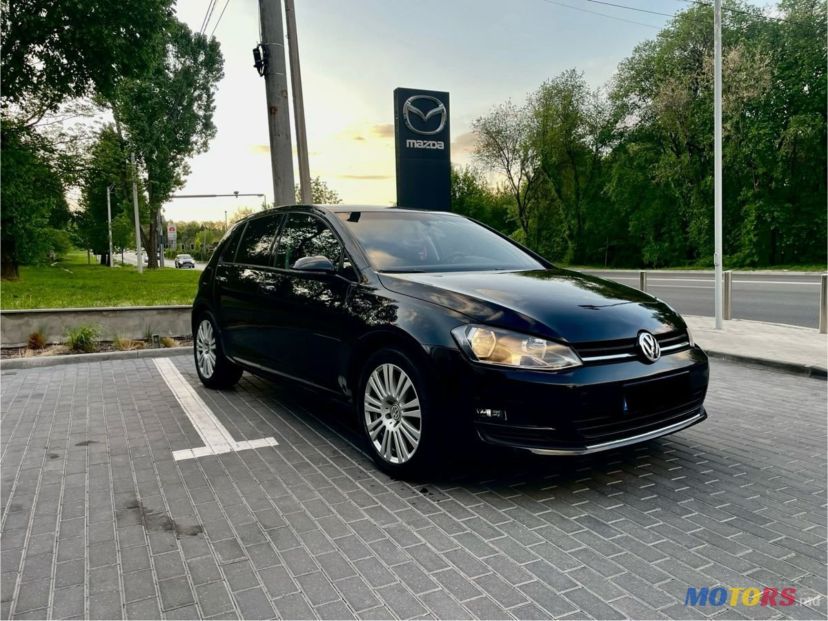 2013' Volkswagen Golf photo #2