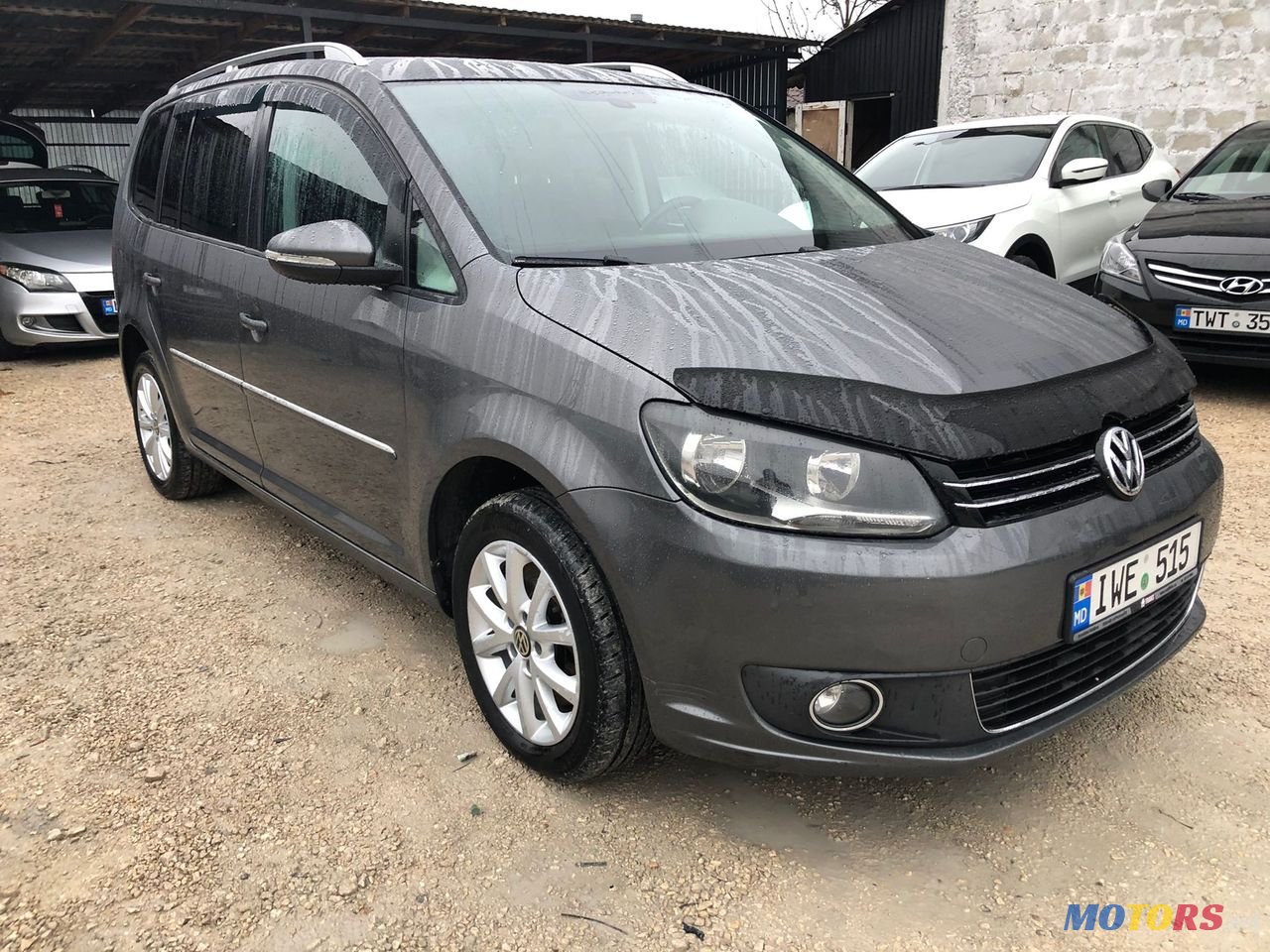 2012' Volkswagen Touran photo #1