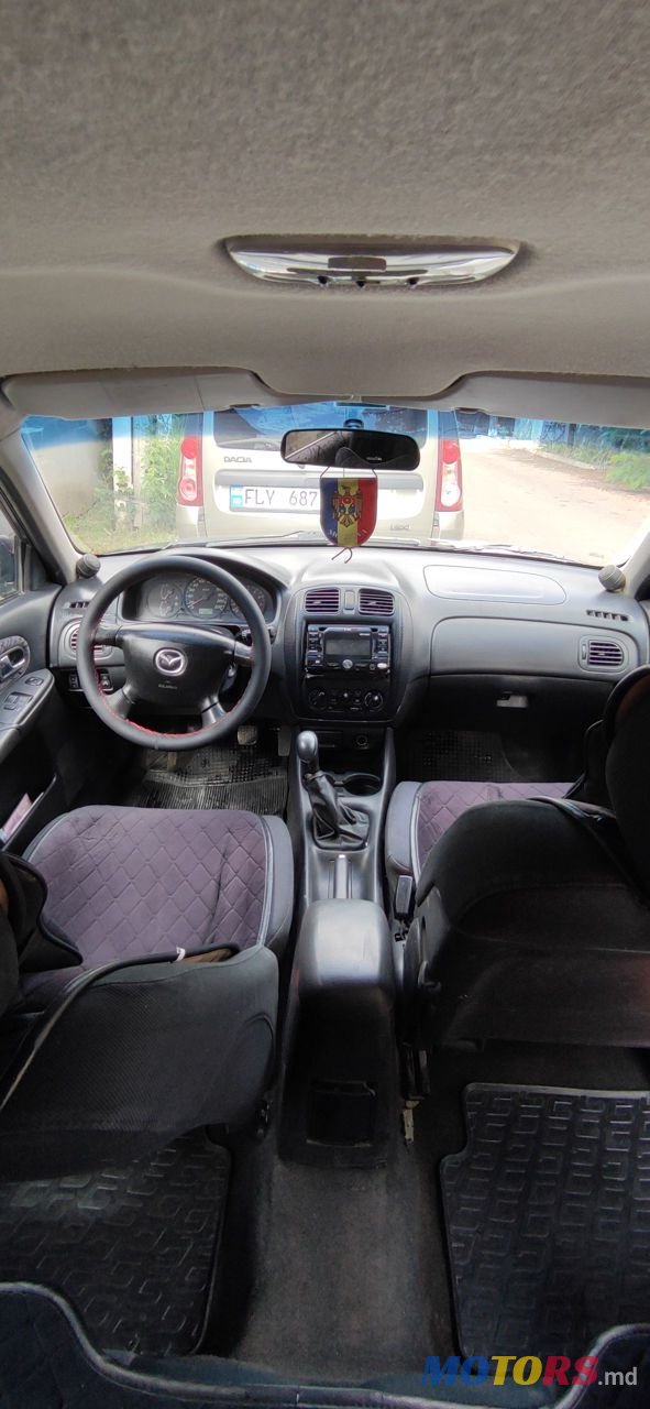 2000' Mazda 323 photo #2