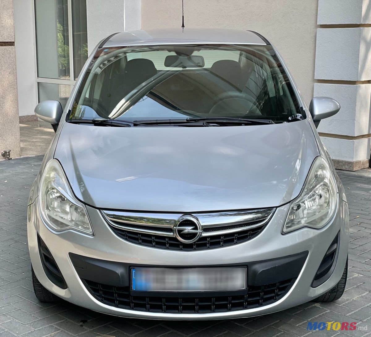 2011' Opel Corsa photo #1