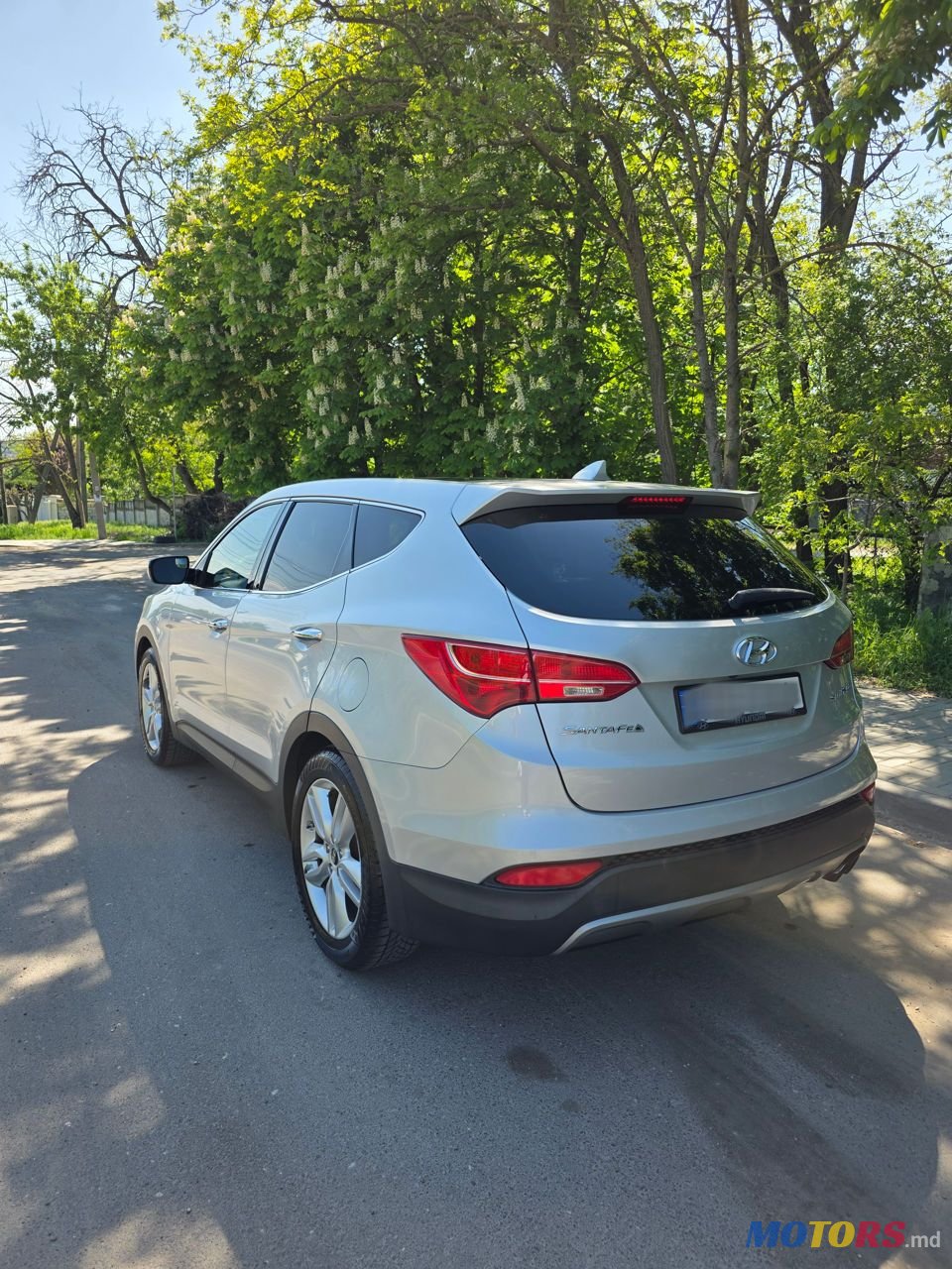 2012' Hyundai Santa Fe photo #3