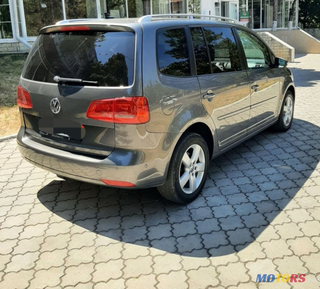 2014' Volkswagen Touran photo #3