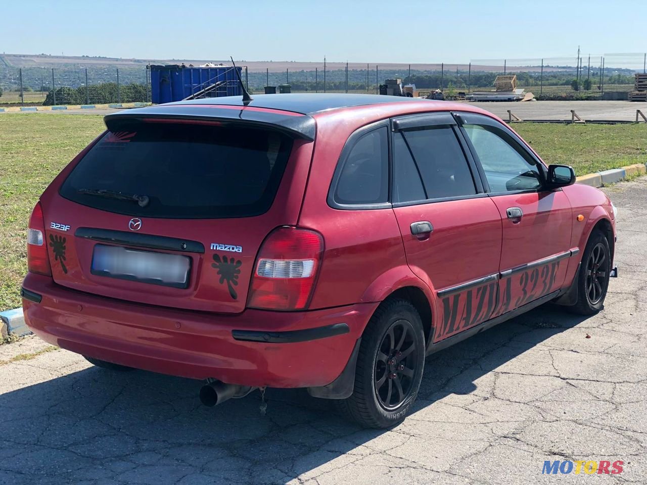 1998' Mazda 323 photo #3