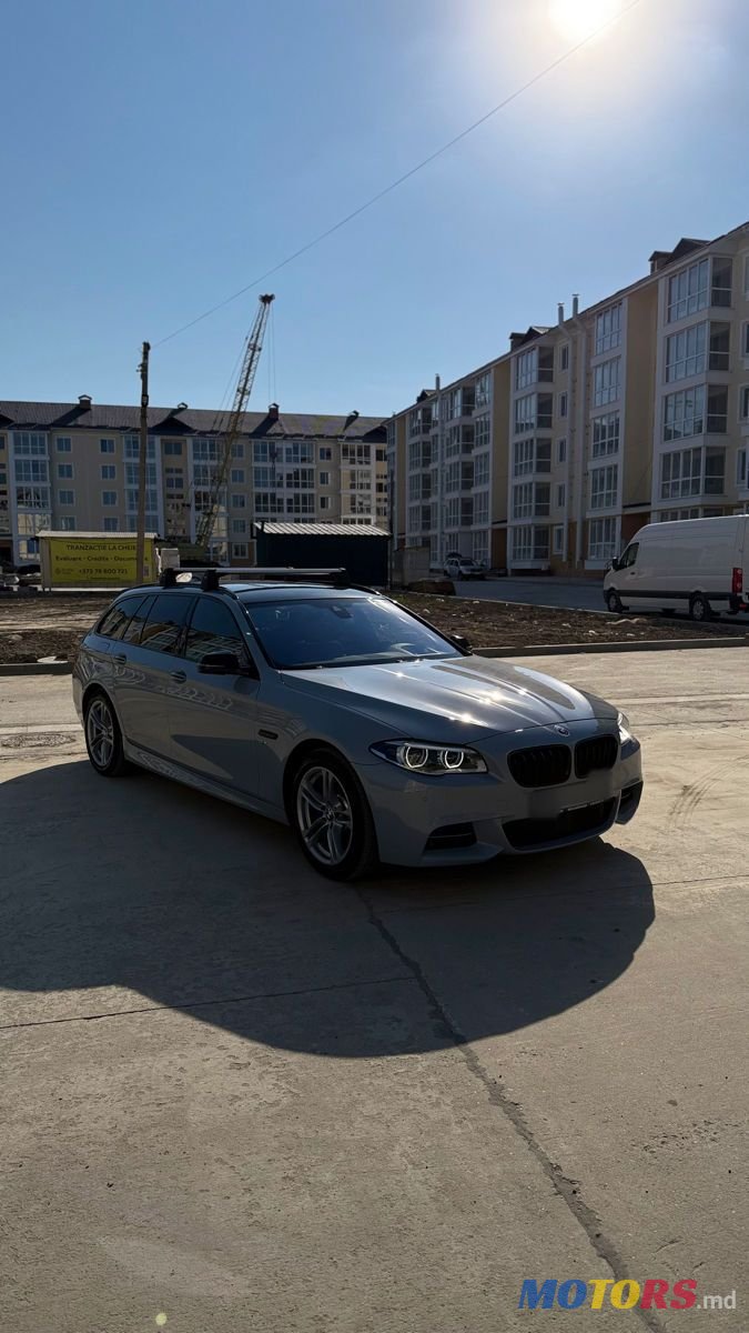 2014' BMW 5 Series Touring photo #2