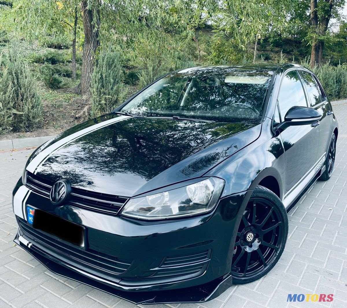 2016' Volkswagen Golf photo #2