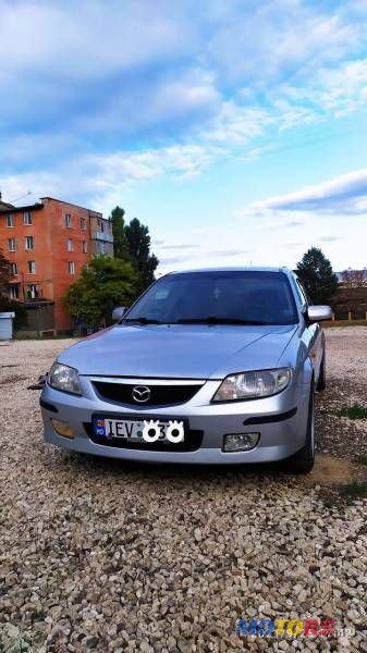 2001' Mazda 323 photo #6