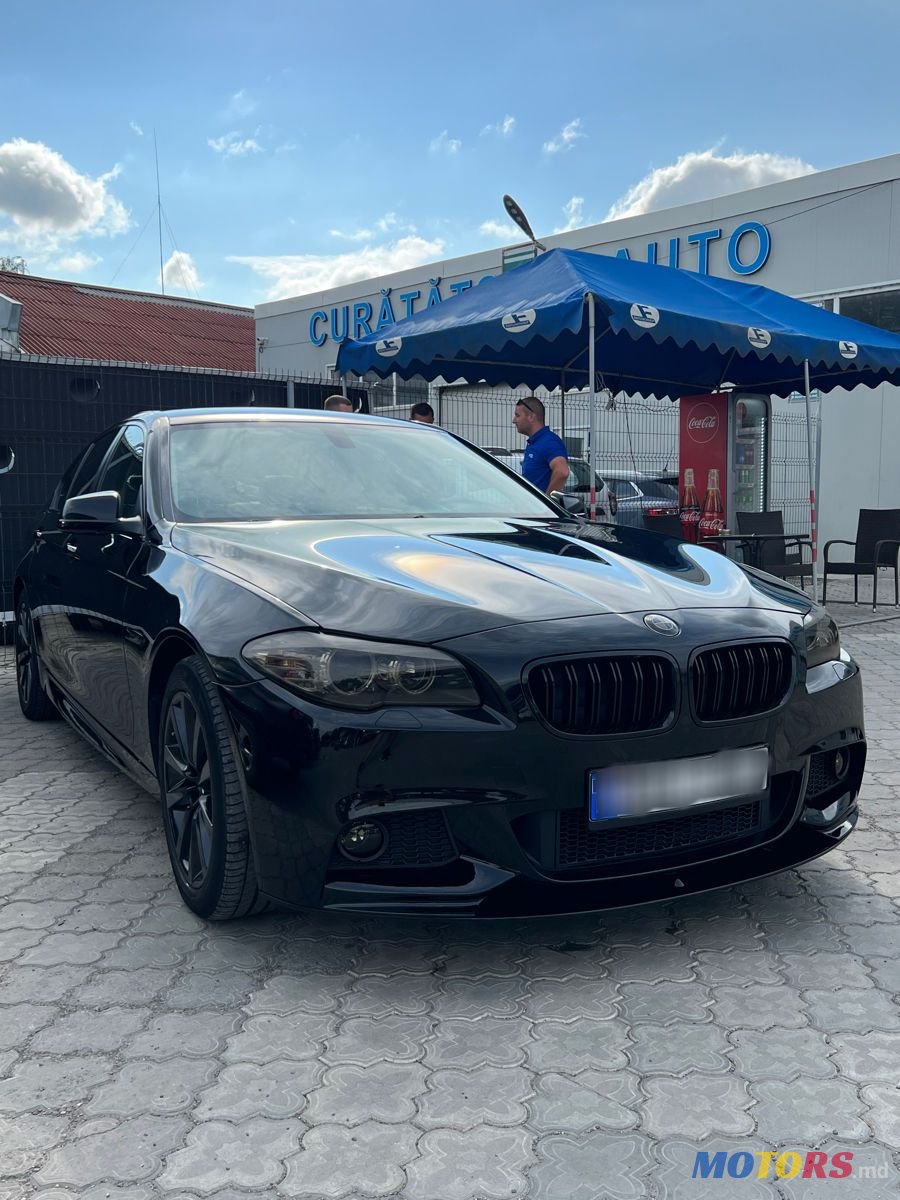 2014' BMW 5 Series photo #1