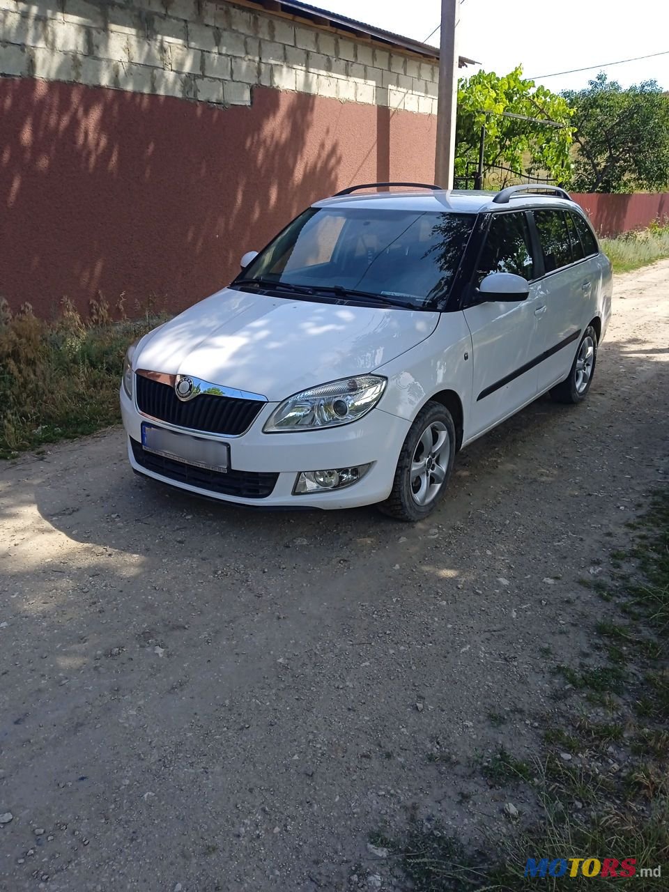 2012' Skoda Fabia photo #1