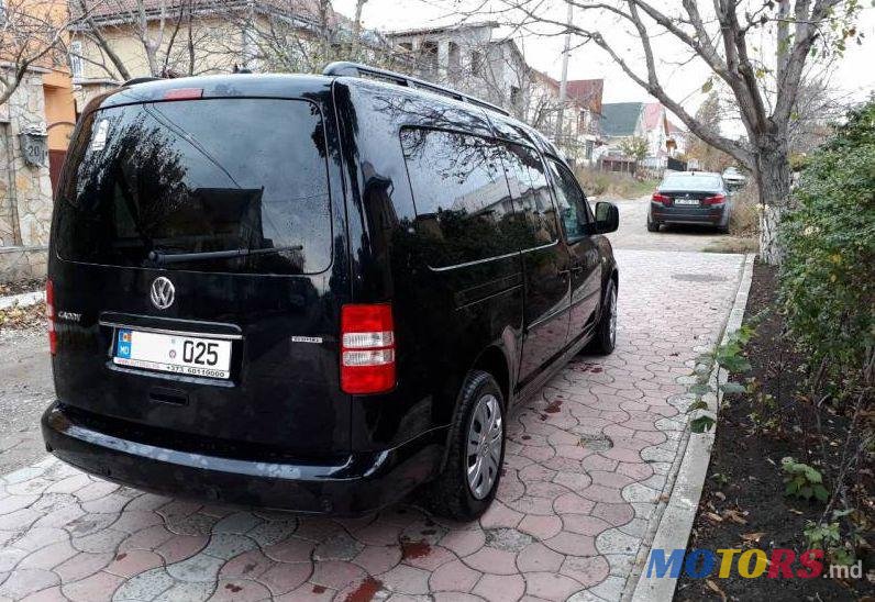 2011' Volkswagen Caddy photo #1