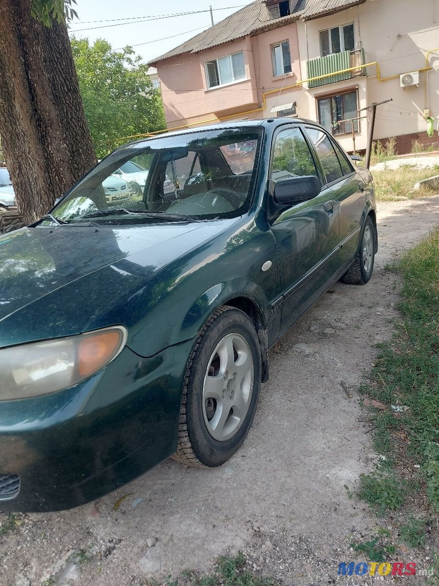 2004' Mazda 323 photo #1