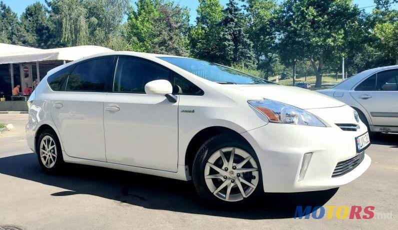 2013' Toyota Prius + photo #1