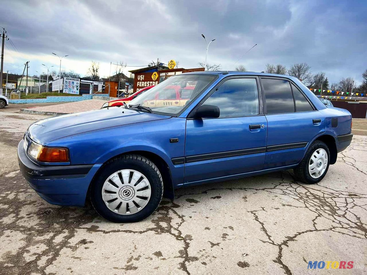 1993' Mazda 323 photo #5