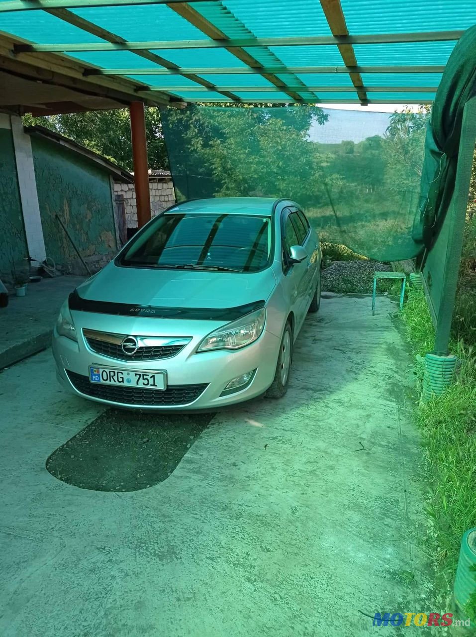 2011' Opel Astra photo #1