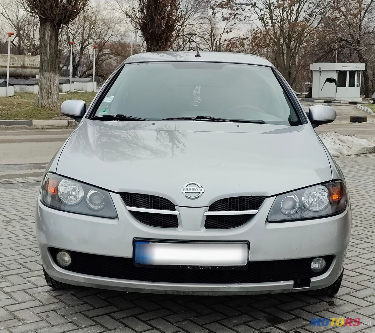 2004' Nissan Almera photo #1