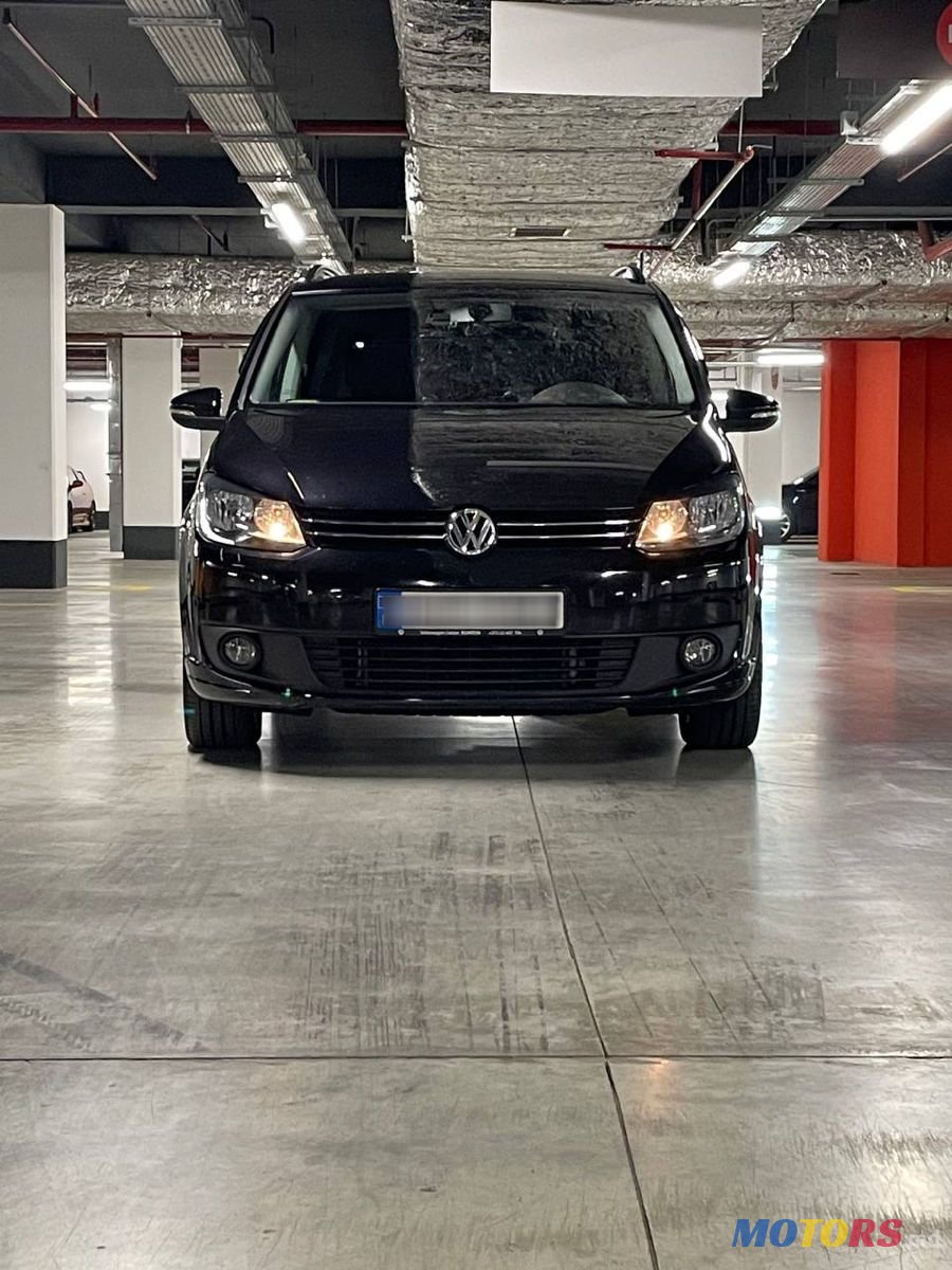 2014' Volkswagen Touran photo #1