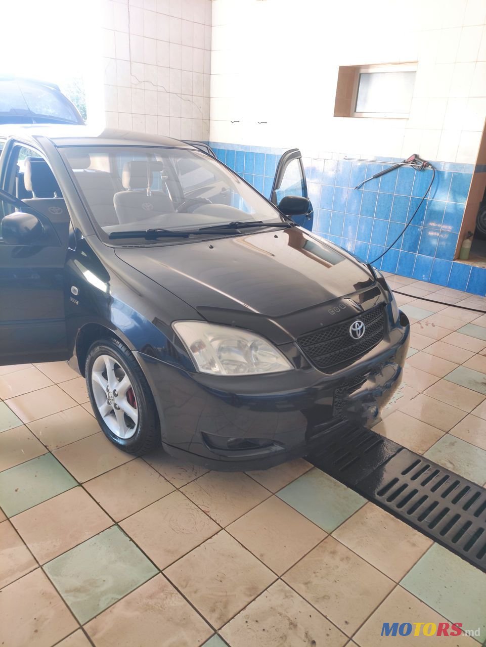 2004' Toyota Corolla photo #1