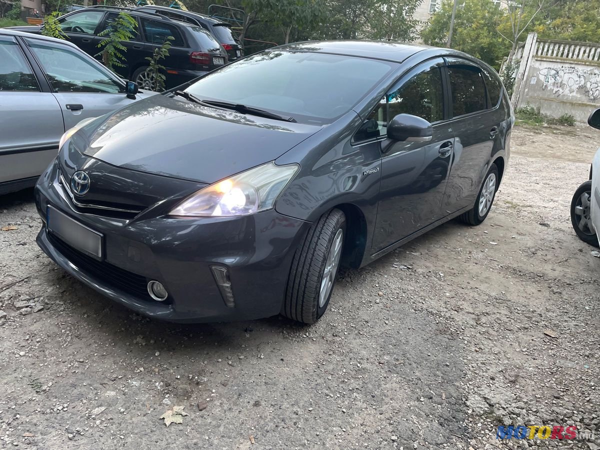 2012' Toyota Prius + photo #1