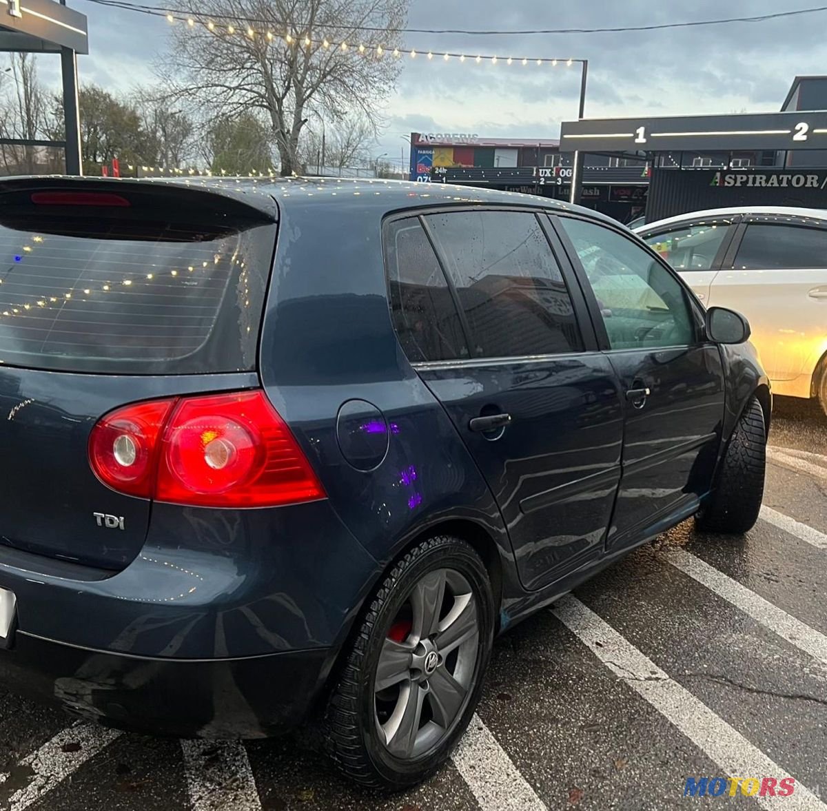 2004' Volkswagen Golf photo #4