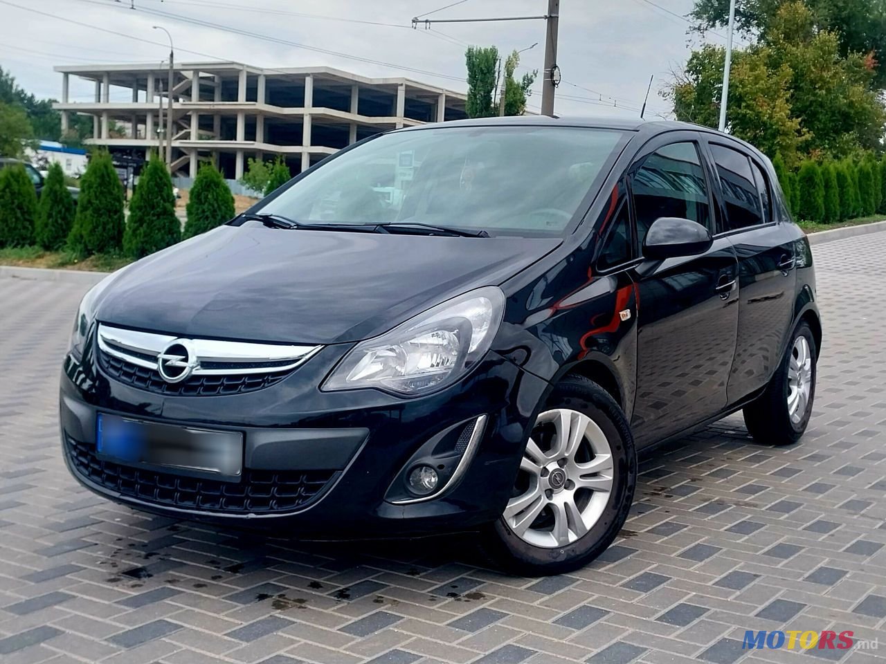 2013' Opel Corsa photo #1