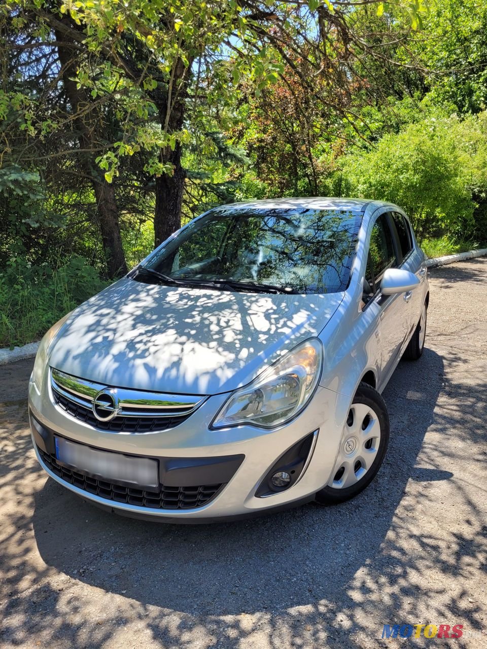 2012' Opel Corsa photo #5