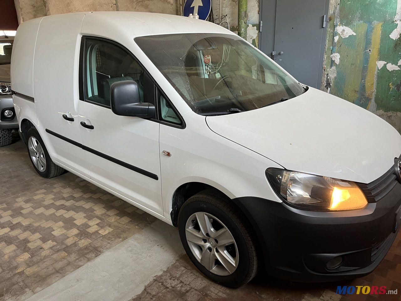 2013' Volkswagen Caddy photo #1