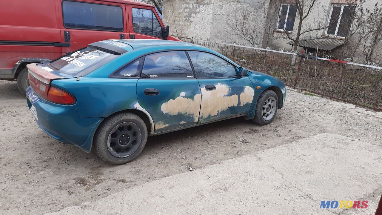 1995' Mazda 323 photo #6