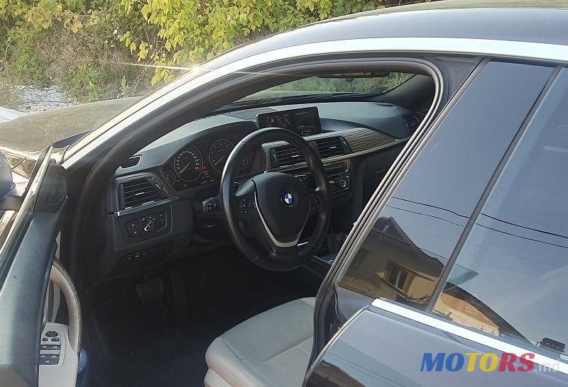 2014' BMW 5 Series photo #4