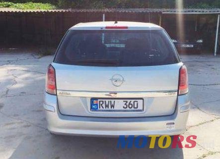 2011' Opel Astra photo #1