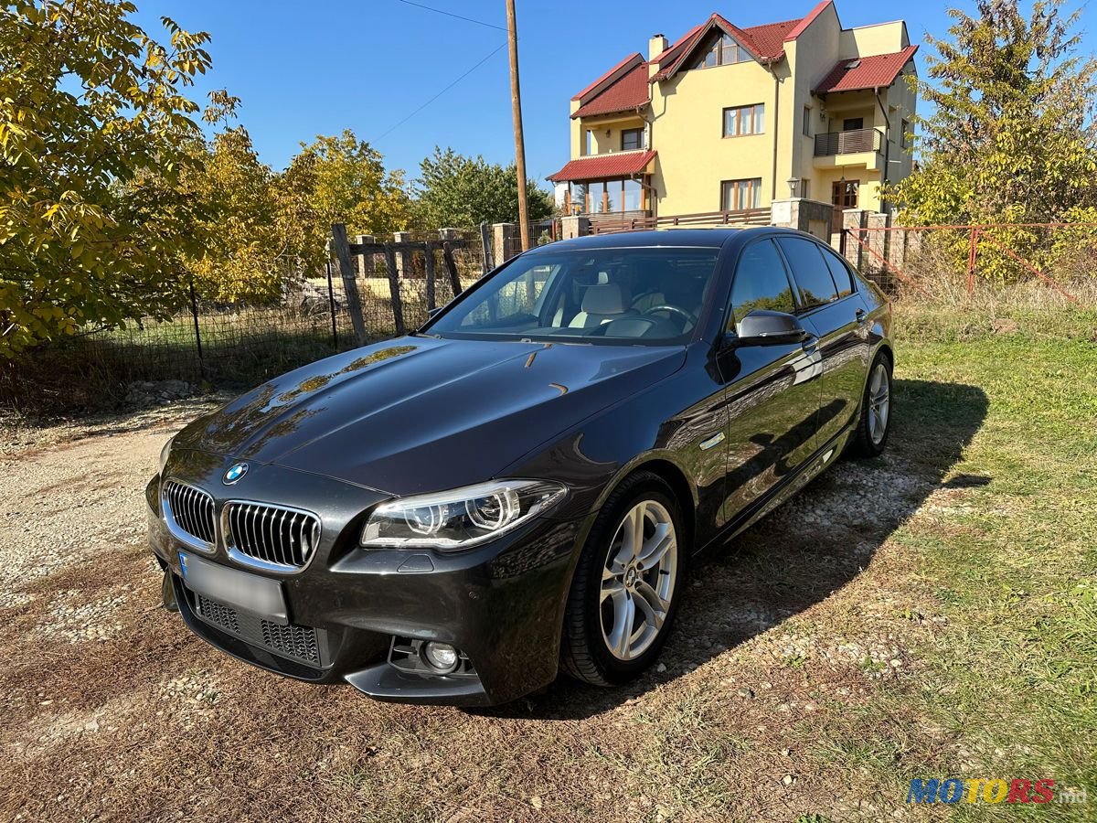 2014' BMW 5 Series photo #1
